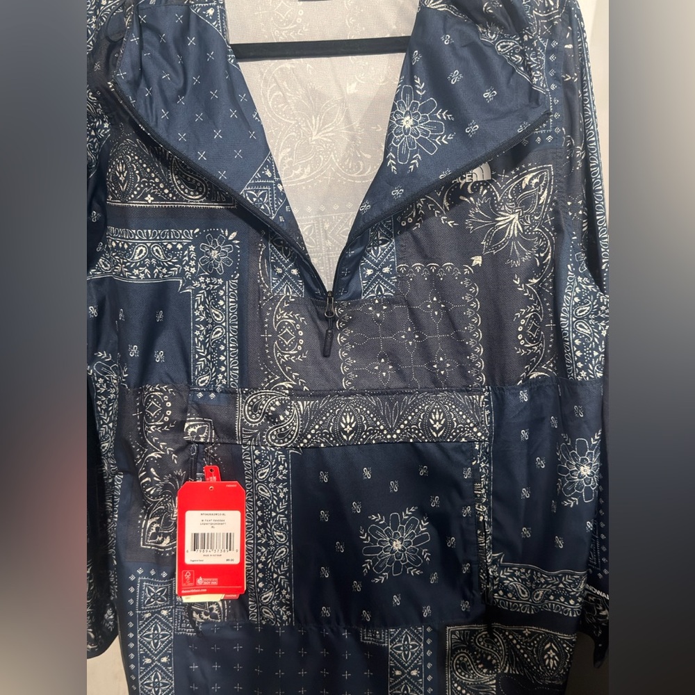 The North Face Blue and White Patterned Jacket